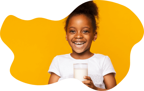 young girl drinking milk